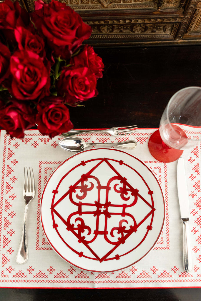 rectangular ivory and red embroidered placemat top view