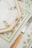 rectangular ivory and green embroidered placemat stitching detail