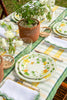 yellow, green and white plaid rectangular tablecloth with tablesetting