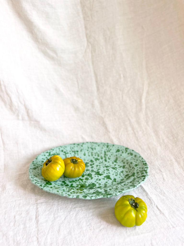 green oval spatterware platter 14" side view
