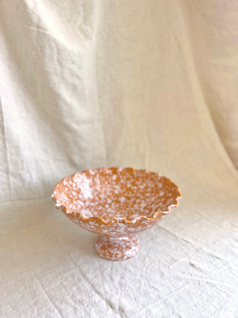 brown spatterware compote bowl on white cloth