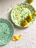 round green spatterware platter 14" with coordinating cream plate
