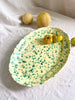 green and cream oval spatterware platter 20" top view