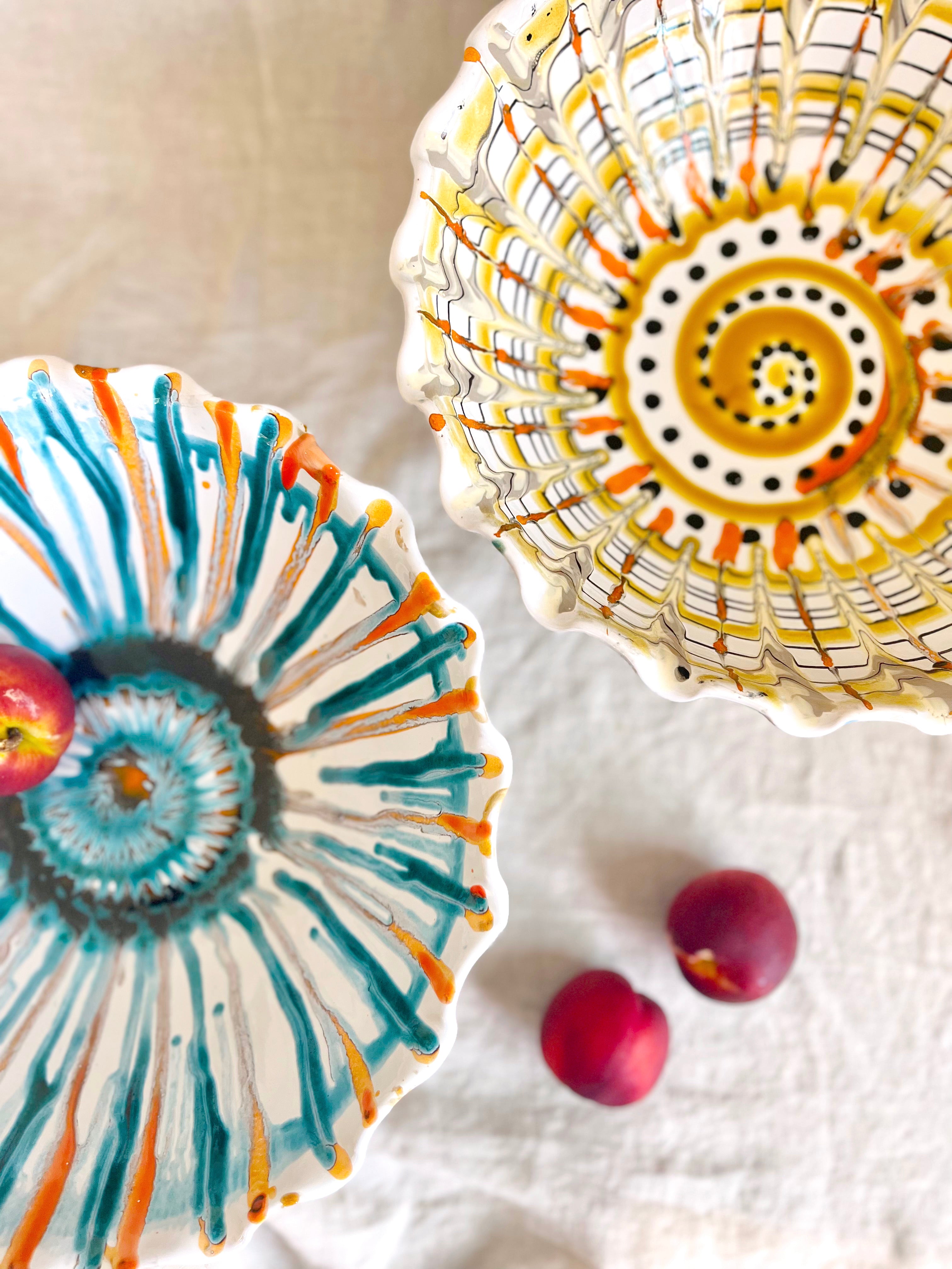 white hand painted compote bowls on white table