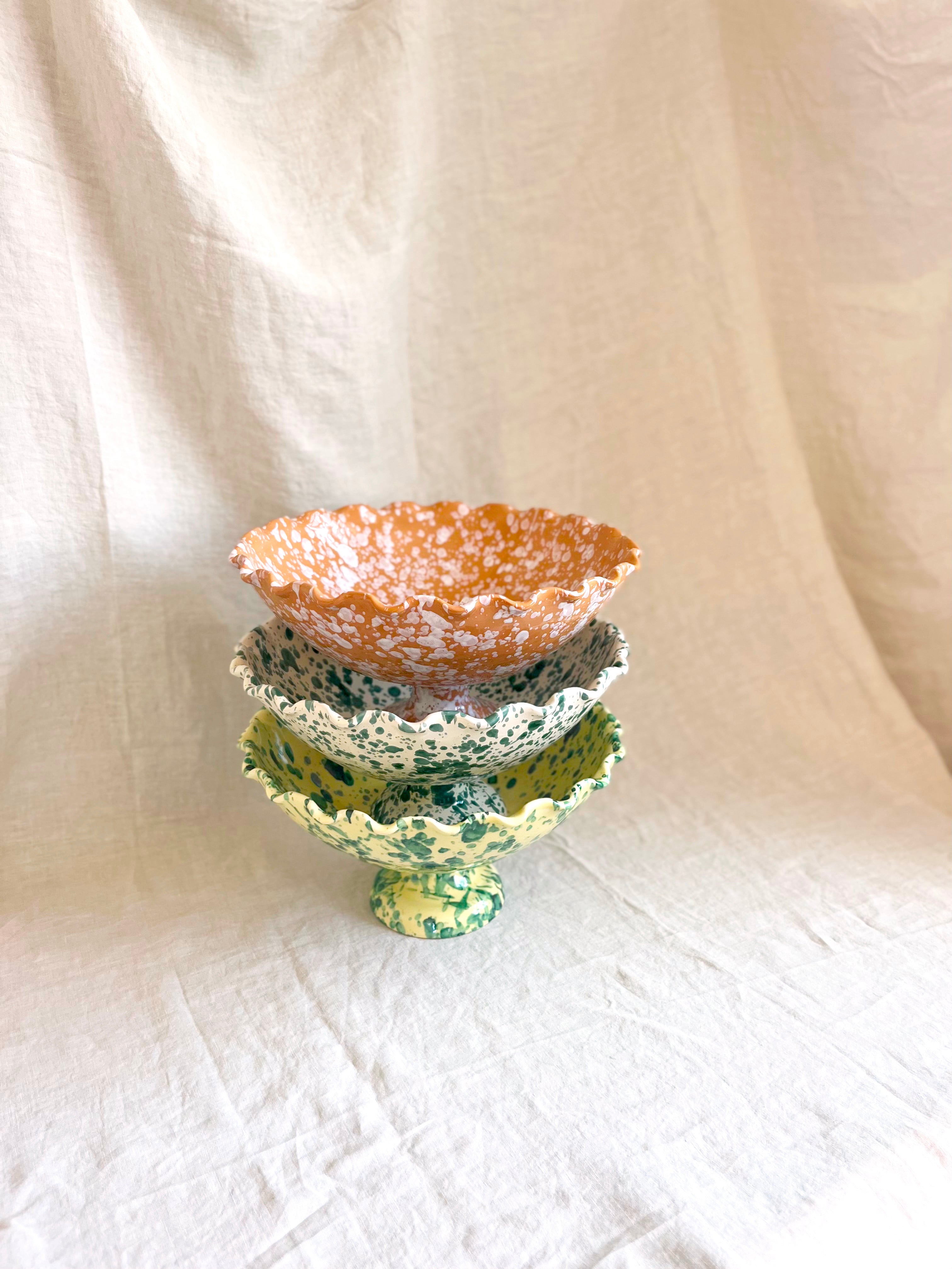 stack of three spatterware compote bowls