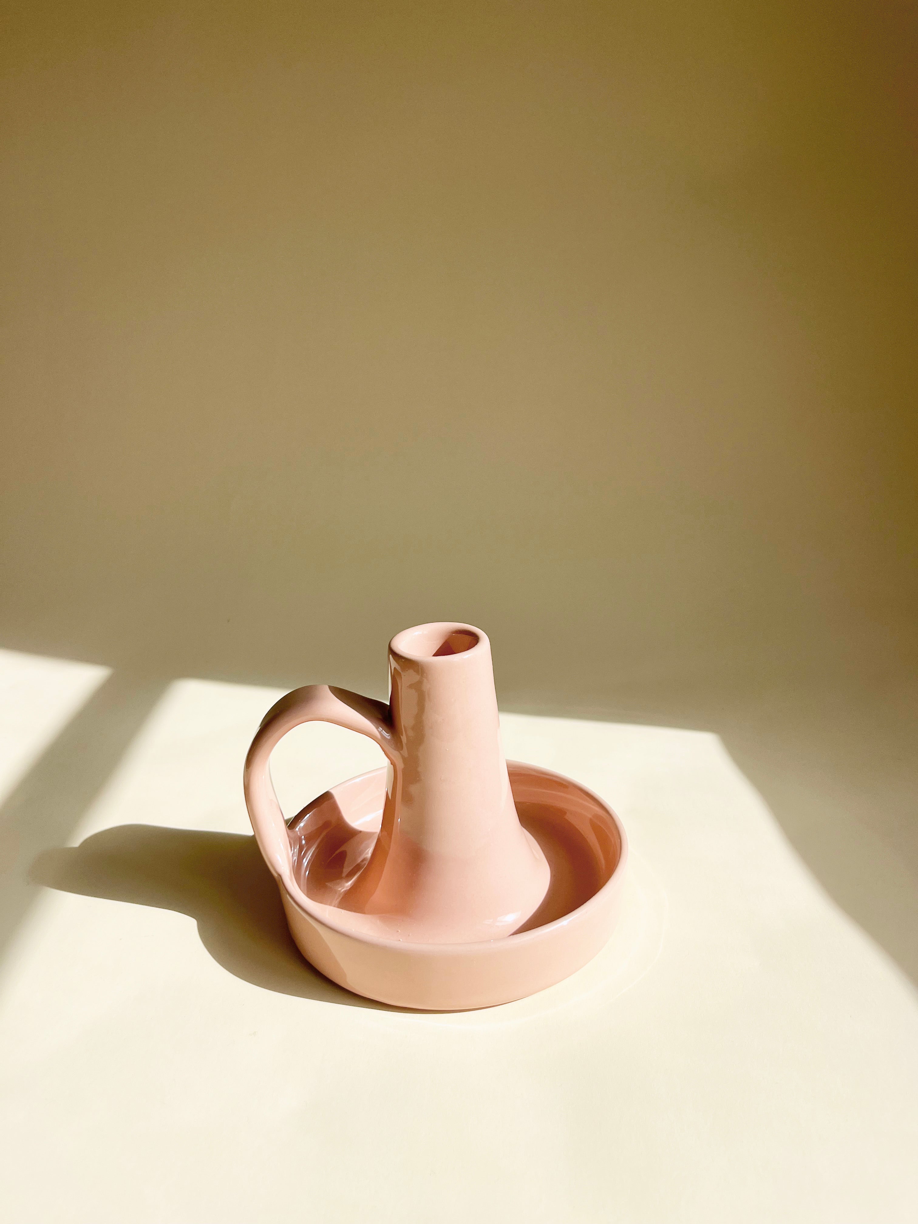 glazed ceramic taper candle holder in pink detail view