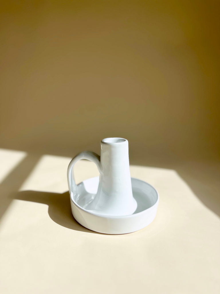 glazed ceramic taper candle holder in white detail view