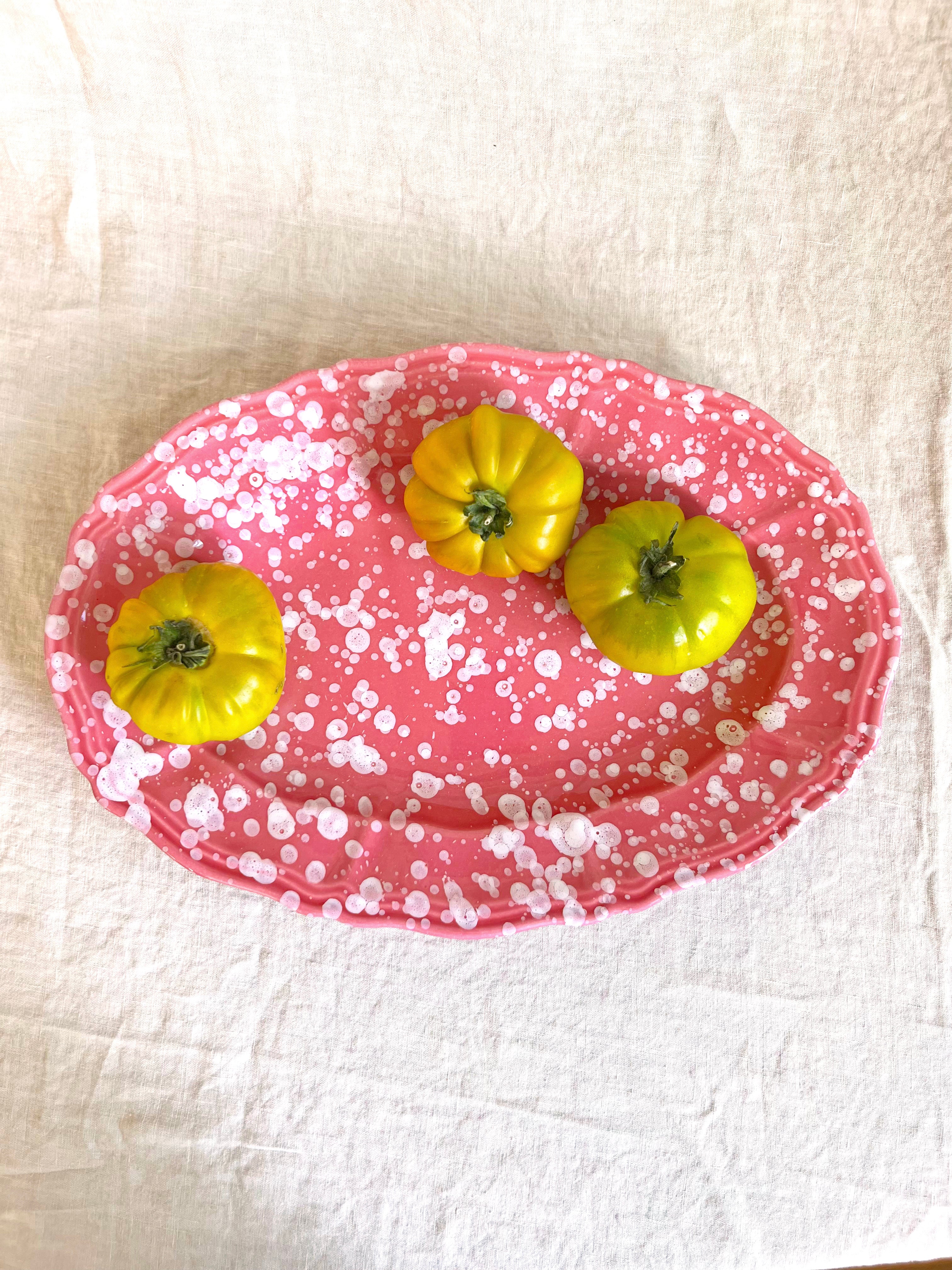 pink and white oval spatterware platter 14" top view