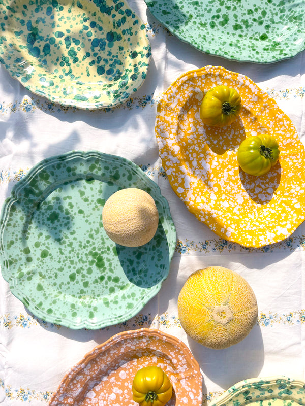 round green spatterware platters in other colors