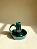 glazed ceramic taper candle holder in green detail view