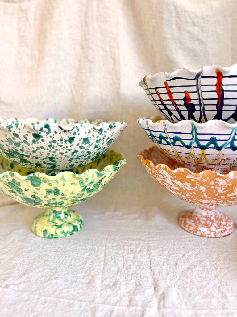 white hand painted compote bowls in multiple patterns