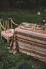 brown, rust and cream rectangular stripe tablecloth, esme stripe print on table