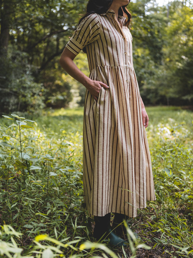 brown and white button front dress in remy stripe pattern pocket