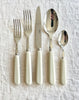 sabre stainless steel flatware set with white resin handle