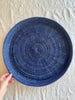 blue round woven tray thirty inches top view