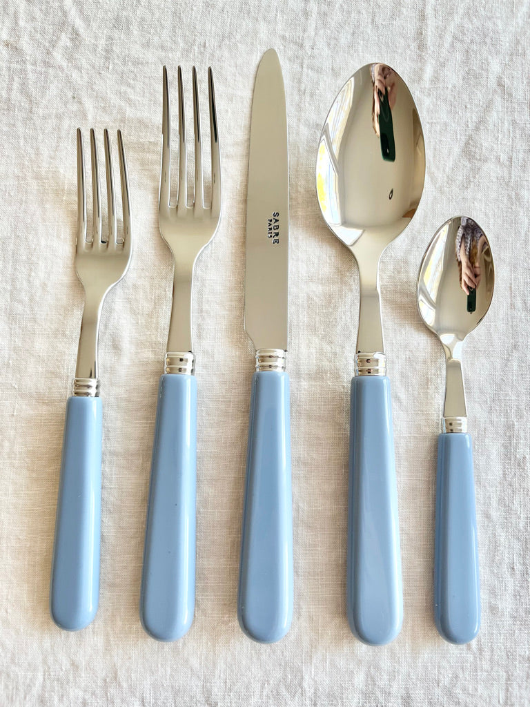 sabre stainless steel flatware set with blue resin handle detail view