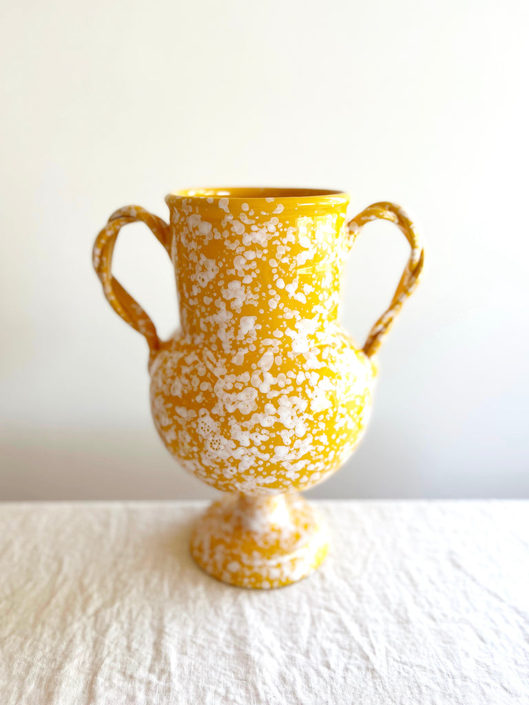 yellow amphora vase with white speckle pattern 13 inches tall