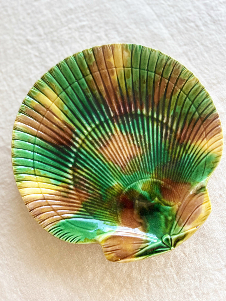 green and brown shell shaped majolica plate detail view