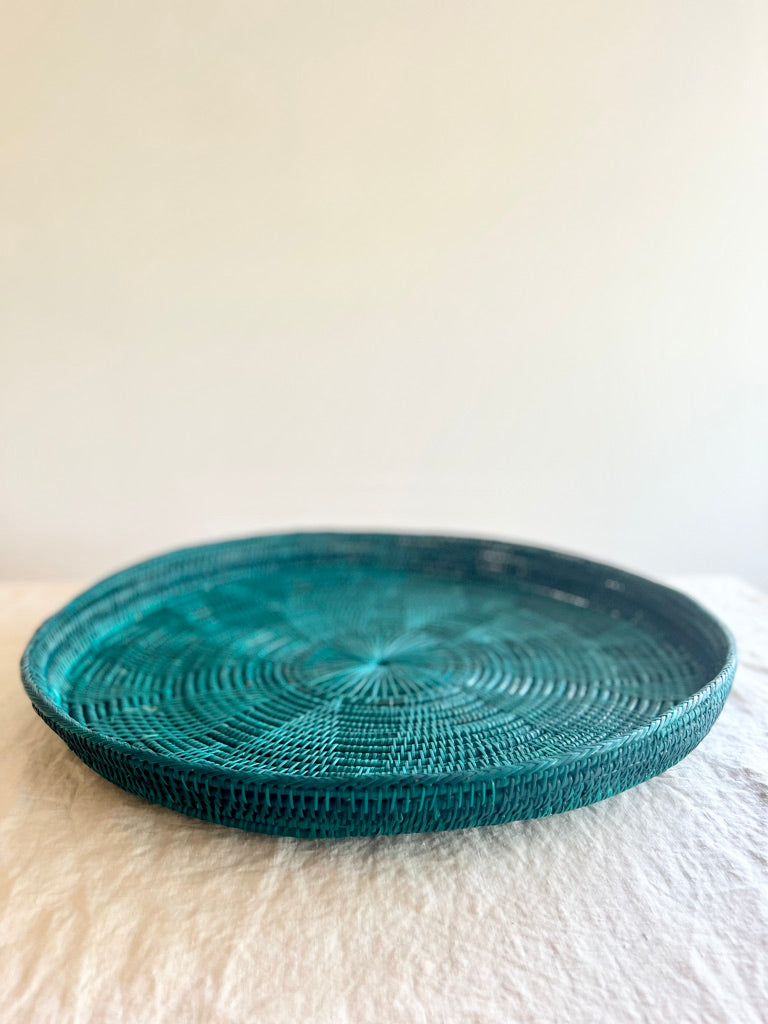 green round woven tray thirty inches side view