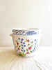 jardiniere planter with blue and pink floral pattern