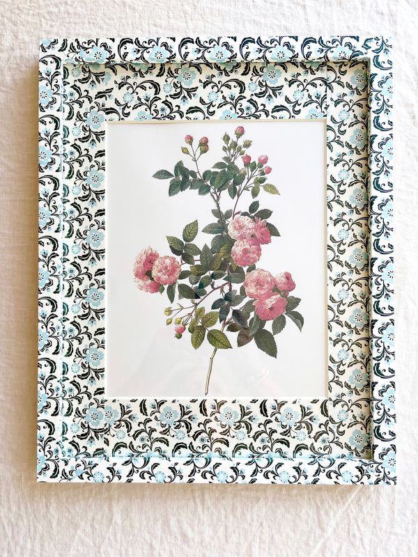 aqua black and white print paper wrapped frame and mat with pink flower botanical print 12" by 15"