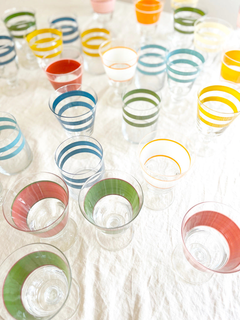 hand painted water glass with two green stripes grouped with other color options