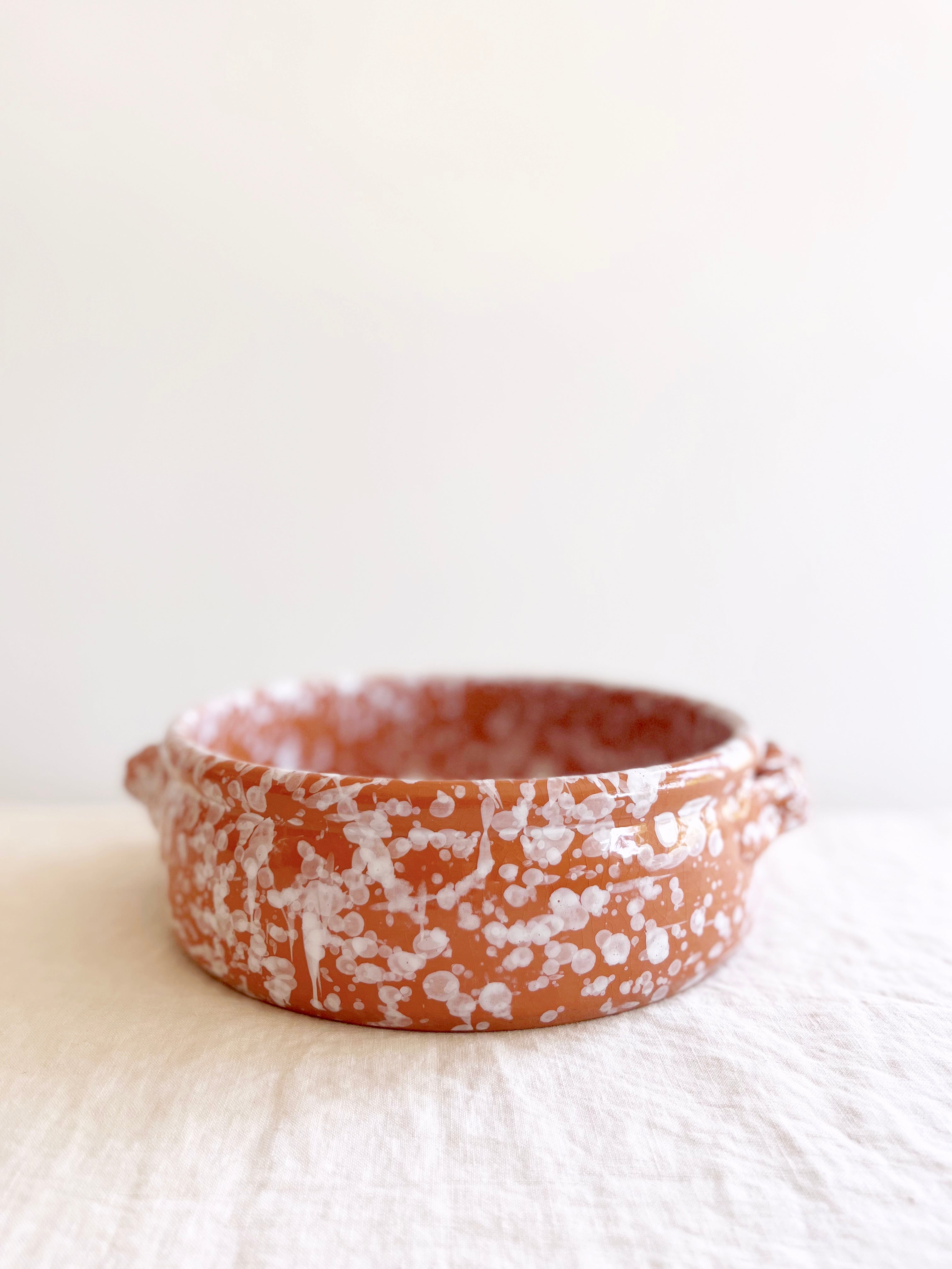 brown oven safe dish with cream speckle pattern 9" diameter