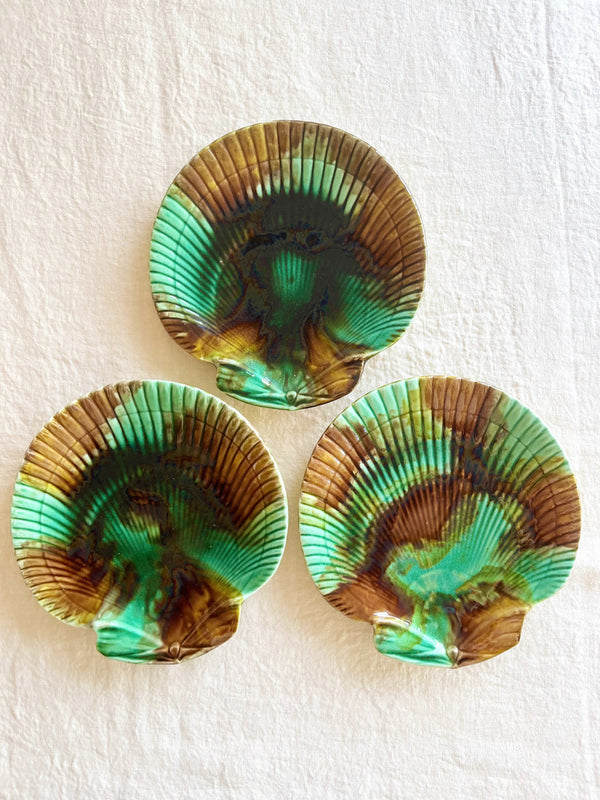 green and brown shell shaped majolica plate