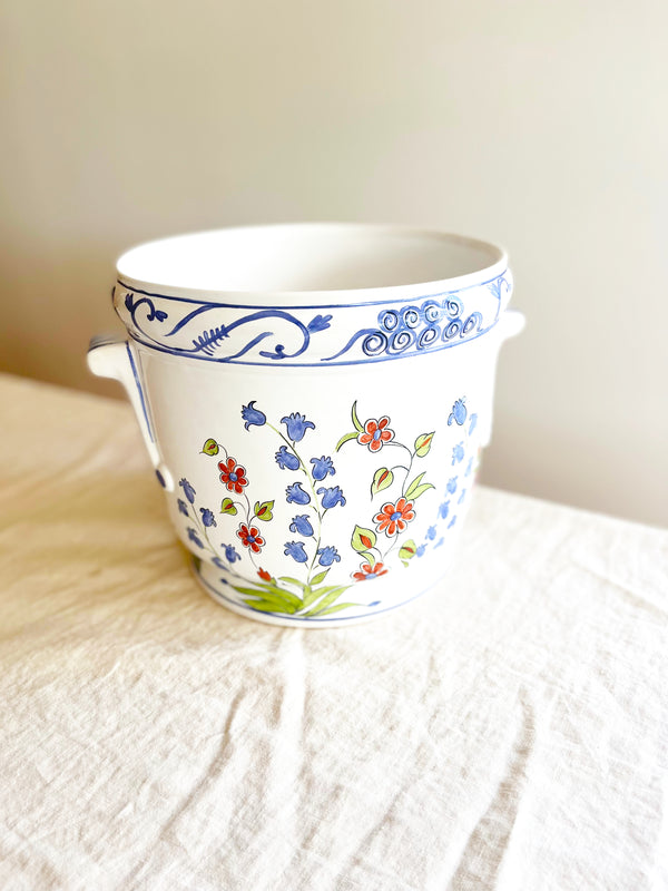 jardiniere planter with blue and pink floral pattern blue and pink floral pattern angled view