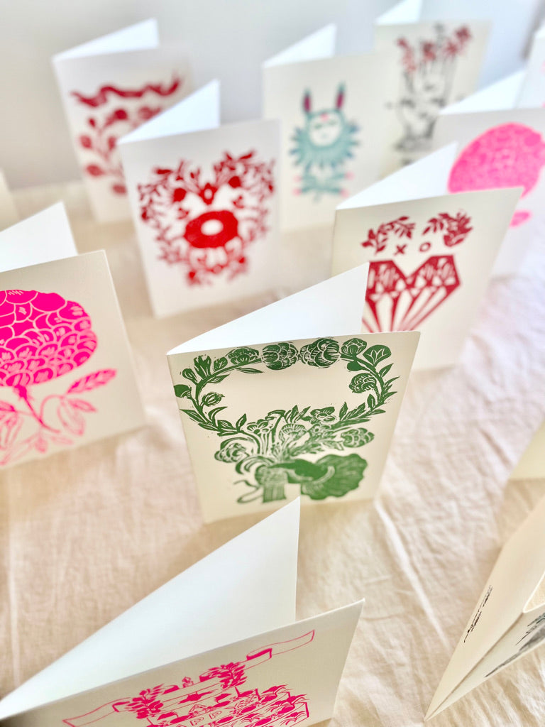 block print hand made card with red heart 7.25" by 10" on white table
