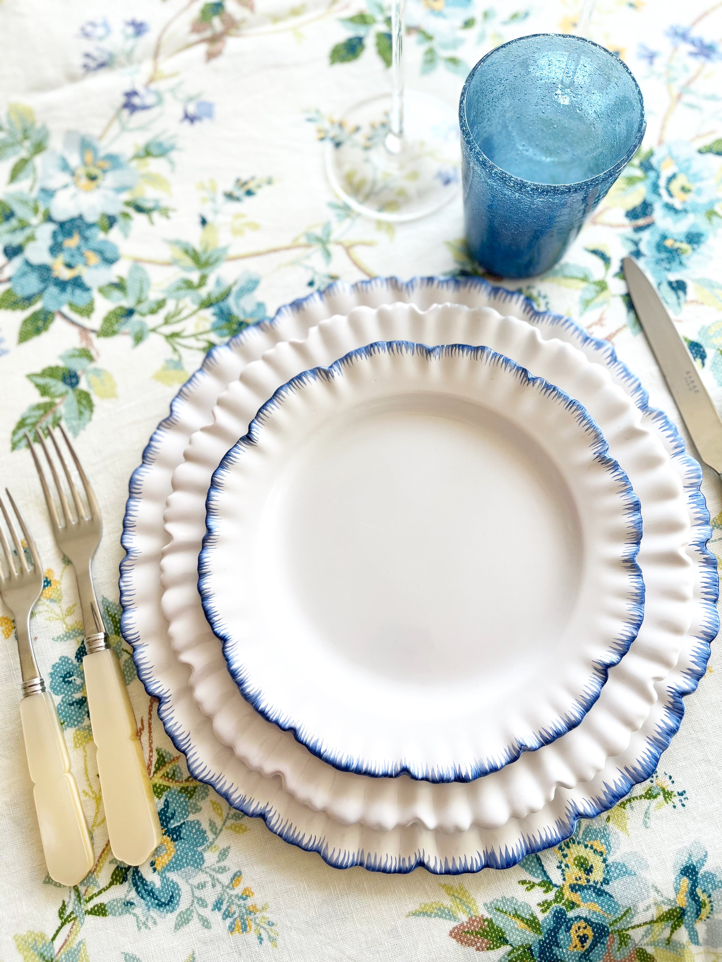 ruffle charger blue edge 11.8 inch stacked on table setting