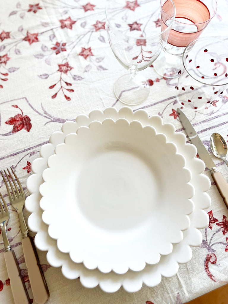 hand painted white salad plate with scalloped edge with dinner plate