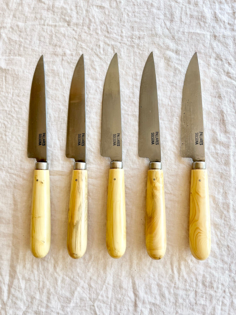 kitchen knife with boxwood handle by pallares solsona carbon steel 12cm five on table
