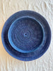 blue round woven tray thirty inches nested with smaller tray