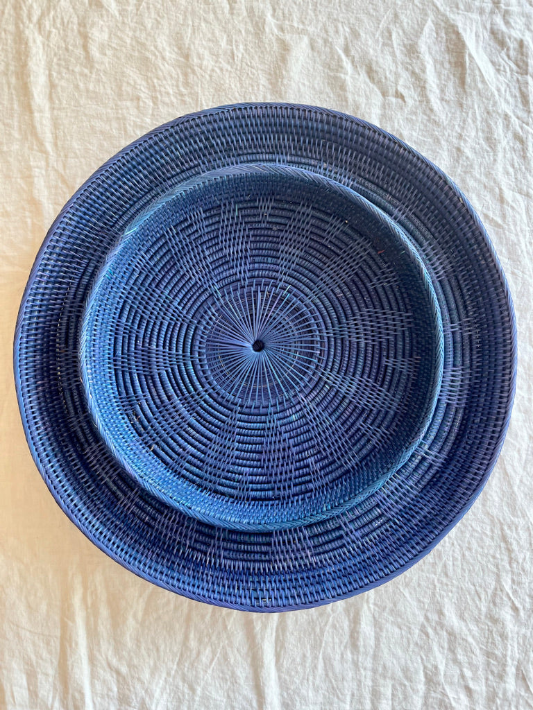 blue round woven tray thirty inches nested with smaller tray