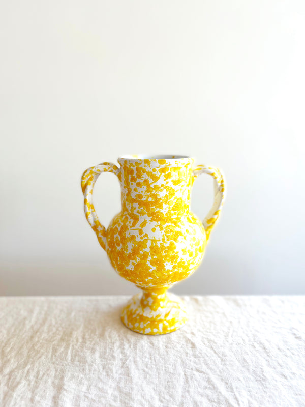 small white amphora vase with yellow speckle pattern 8.25 inches tall