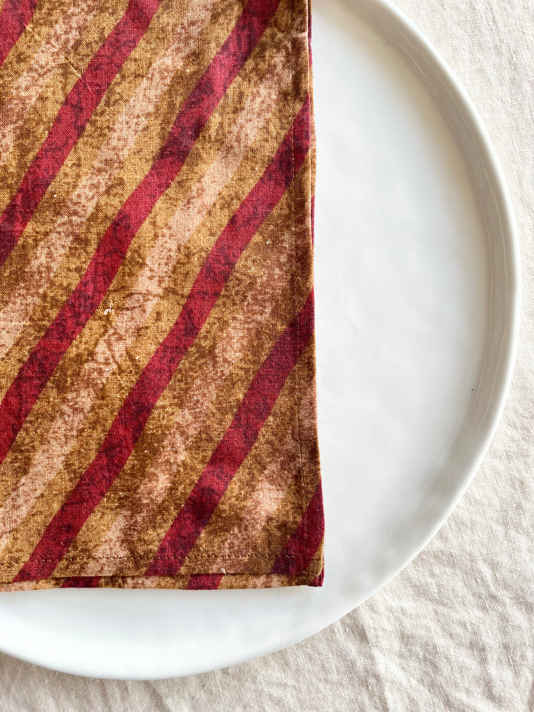red gold and tan striped cotton napkin