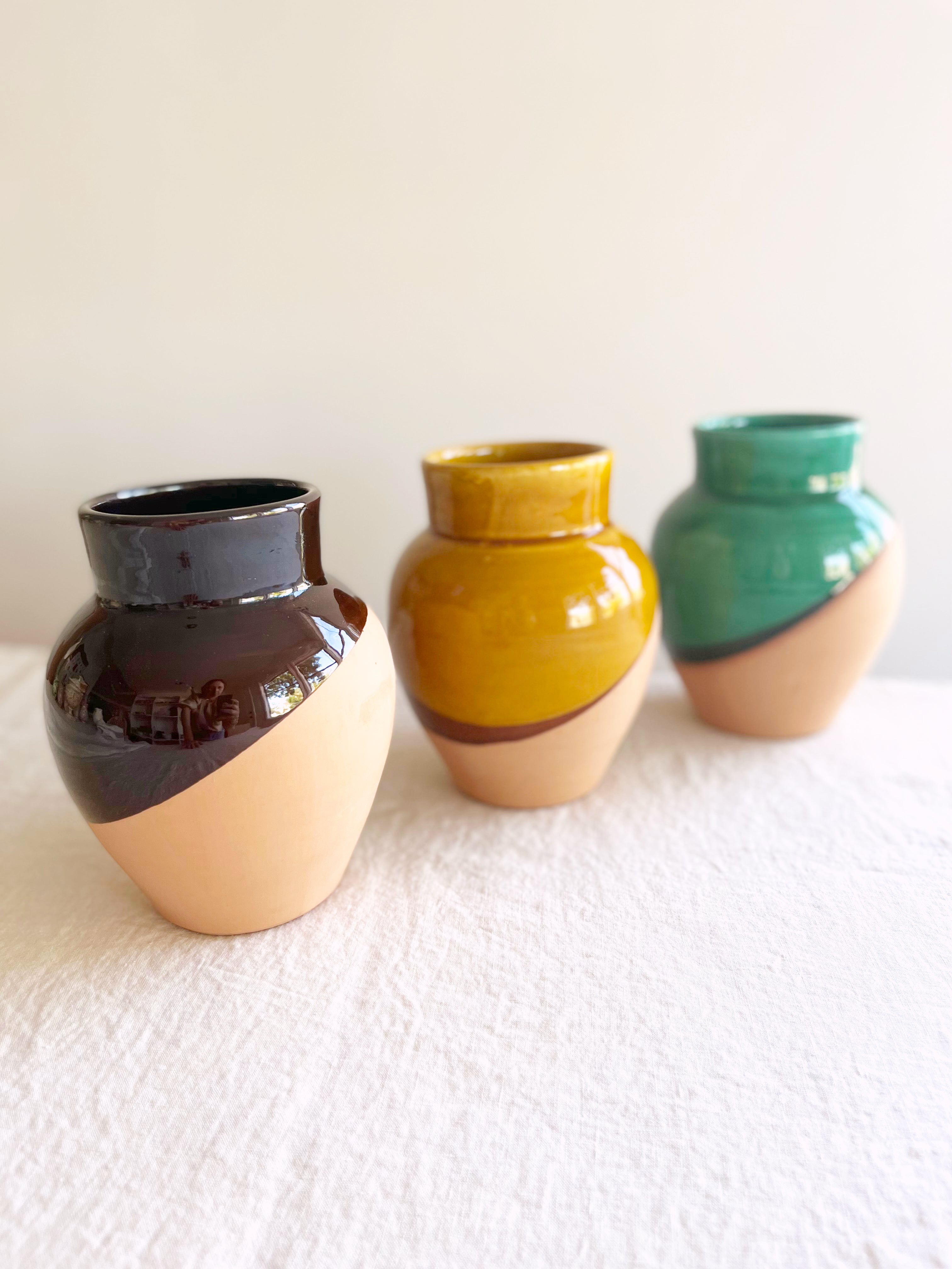 gold red and cream pottery vase 7 inches tall in group with other color options