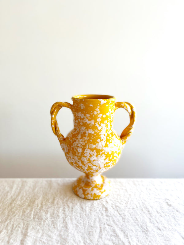 small yellow amphora vase with white speckle pattern 8.25 inches tall