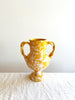 small yellow amphora vase with white speckle pattern 8.25 inches tall