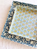 square green paper tray with yellow sunflowers and white daisy print 8 inches detail view