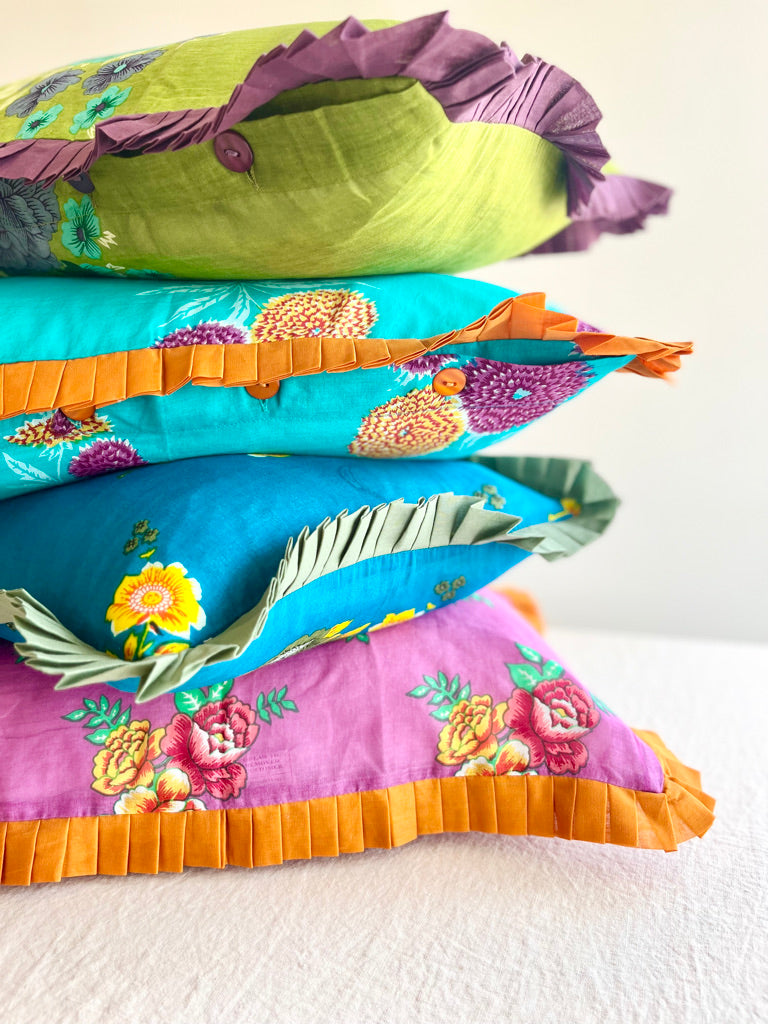 Pink and yellow floral ruffle pillow cover 14 inch stacked