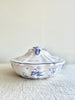 white covered serving dish with blue phoenix design