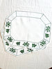 octagonal white linen placemat with olive green embroidery 19.5" by 16" group of two