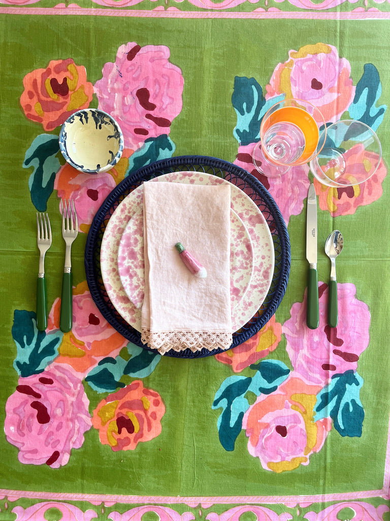 green and blue striped square cotton tablecloth with navy border and roses in center 86" by 86" with pink and white plates