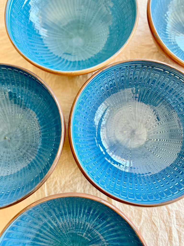 group of blue pasta bowls with peacock pattern twelve inch aegean