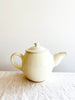 white teapot detail
