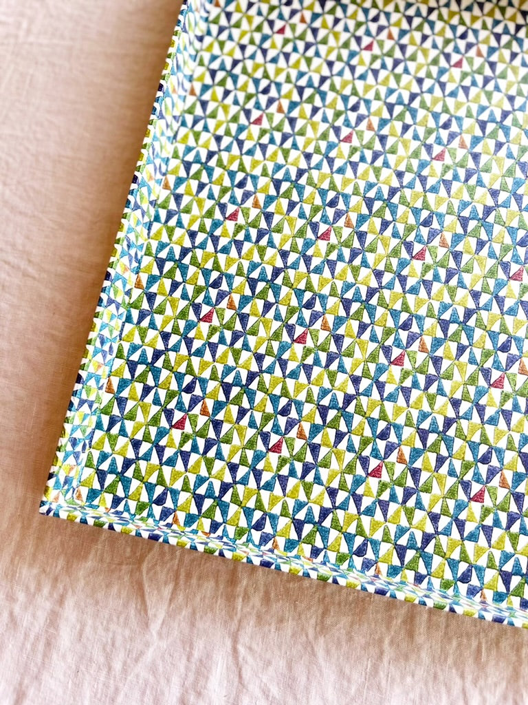 square paper tray with blue green pink and white triangle print 13 inches detail view