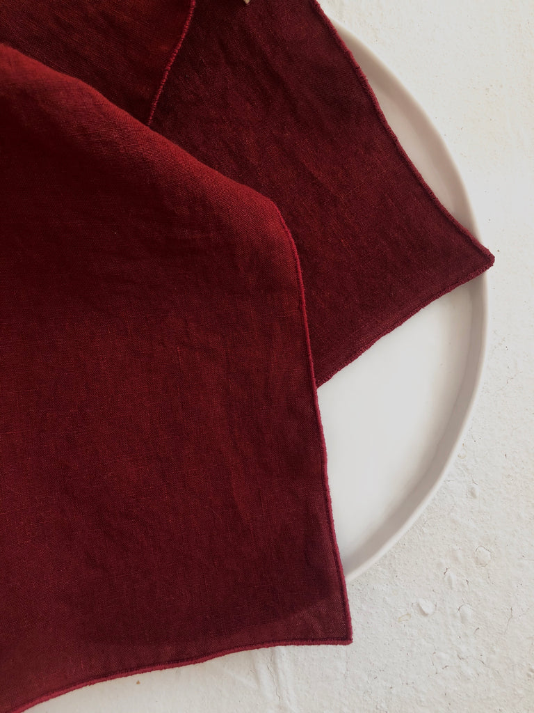 red linen rolled edge linen napkins with red edge 18" square