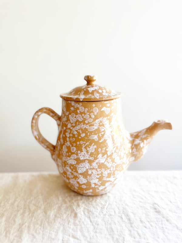 coffee pot with splatter pattern in sienna color side view